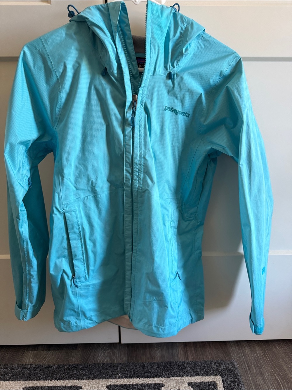 Patagonia Women’s Aqua Blue Hooded Raincoat
